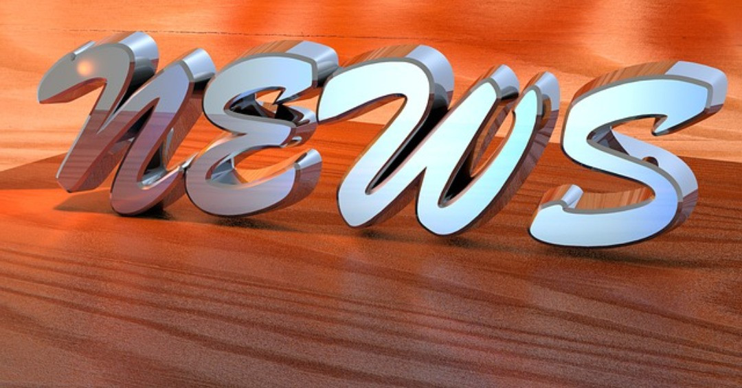 Image of text News on wood background